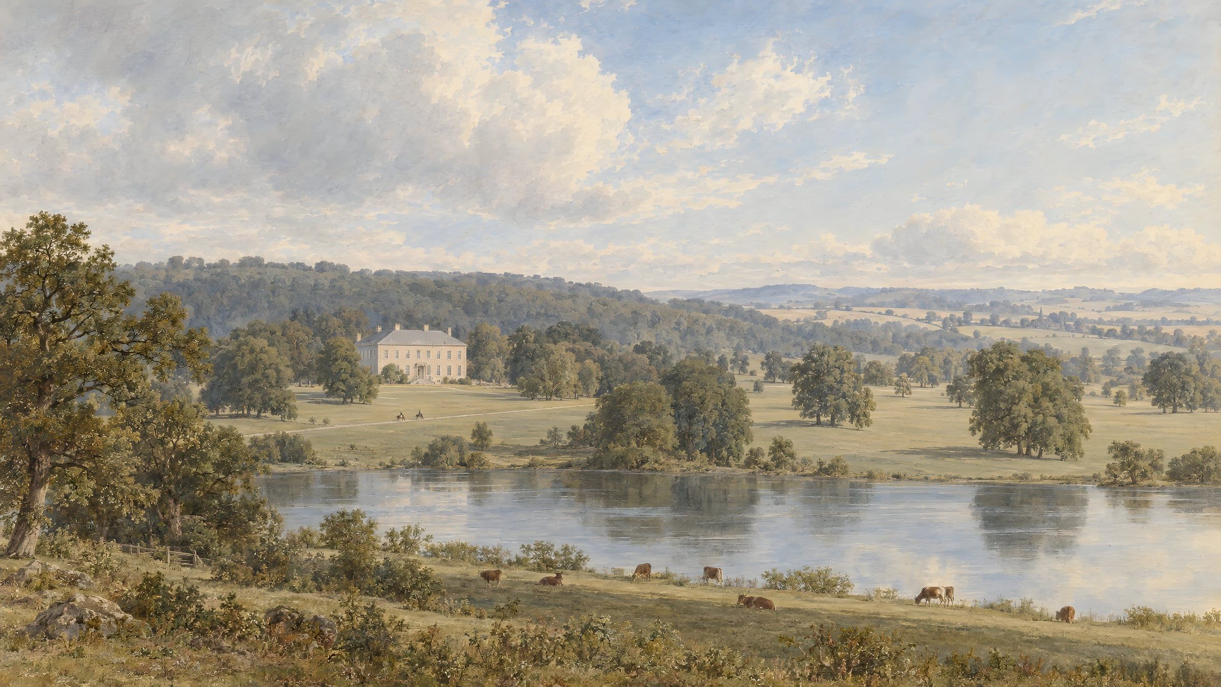 A landscape park with a lake and a white house under a blue sky